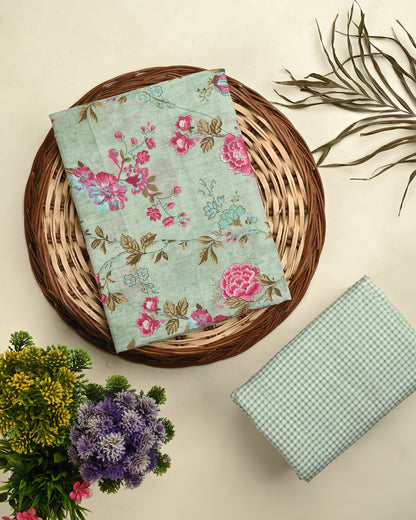 Floral fabric on a woven plate with a box and plants on a beige background